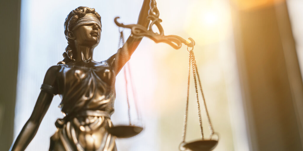 Judge Freezes SEC Lawsuit Against Coinbase Amid `Conflicting` Crypto Rulings